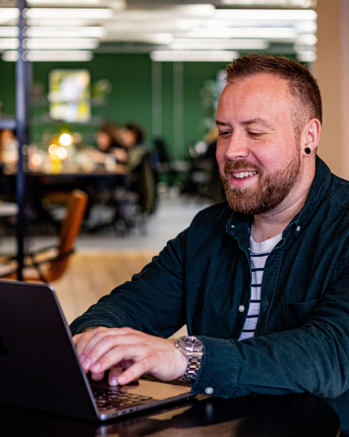 Jason Smith at his computer Gather Round