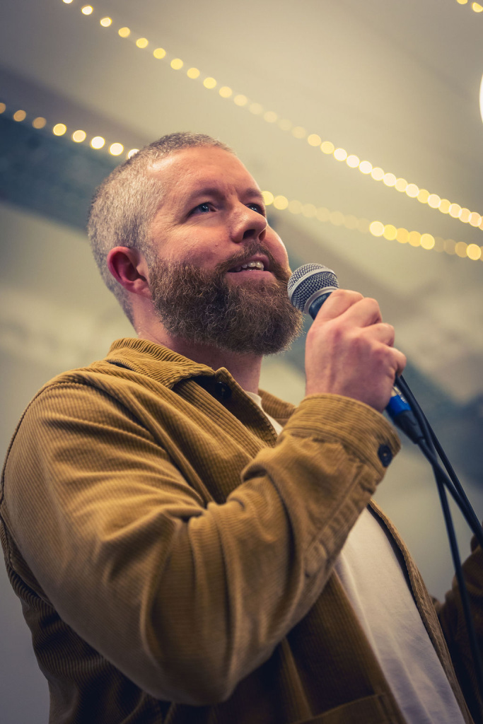 Dan Caufield at Gather Round on the mic