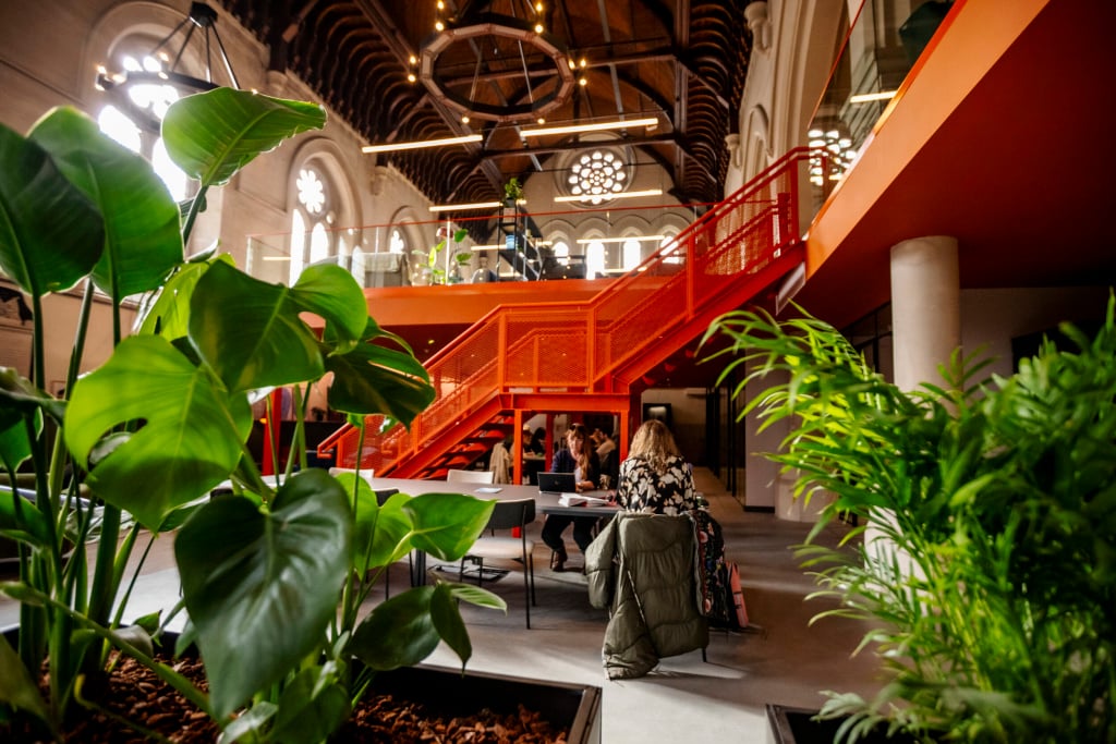 Red staircase at the coworking space in bath Gather Round Trinity Church