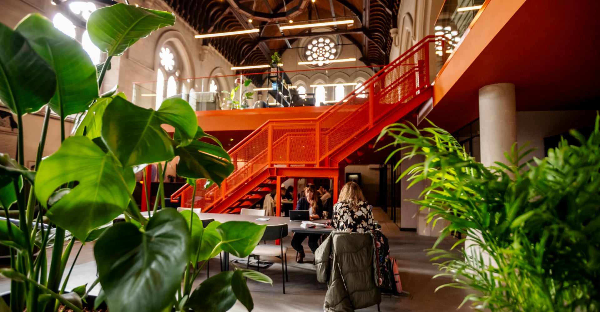 Red staircase at the coworking space in bath Gather Round Trinity Church