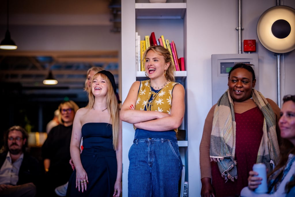 Jess Knights and Sarah O'Connell laughing at the Gather Round event
