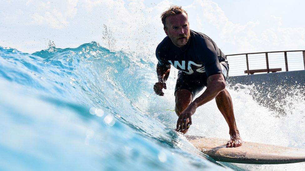 Nick Hounsfield, Founder of The Wave, surfing at The Wave