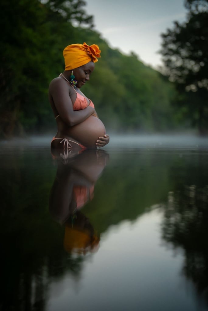 Aggie Nyagari-Salt Film Director and producer standing in the River Avon